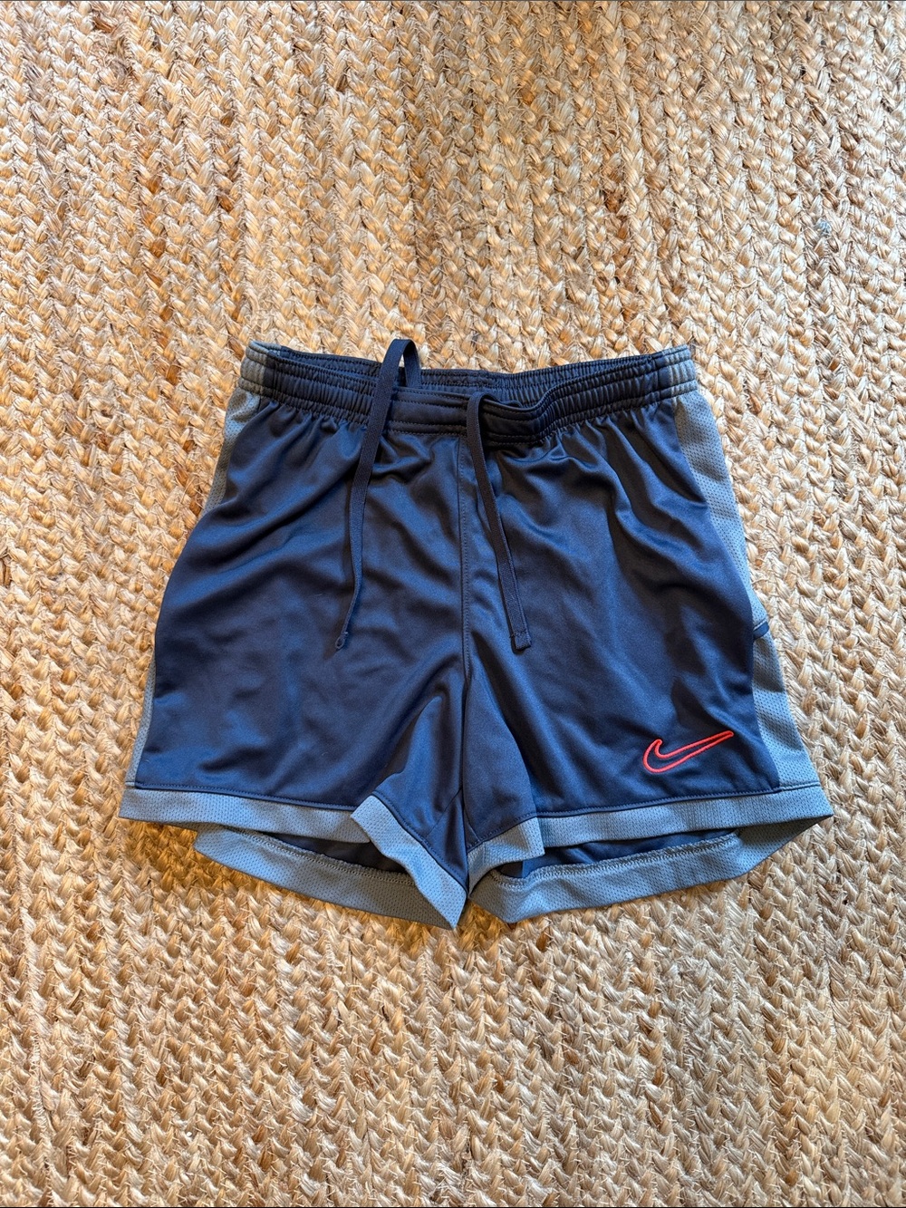 Nike Women's Navy Athletic Shorts with Light-Blue Trim and Pink Swoosh